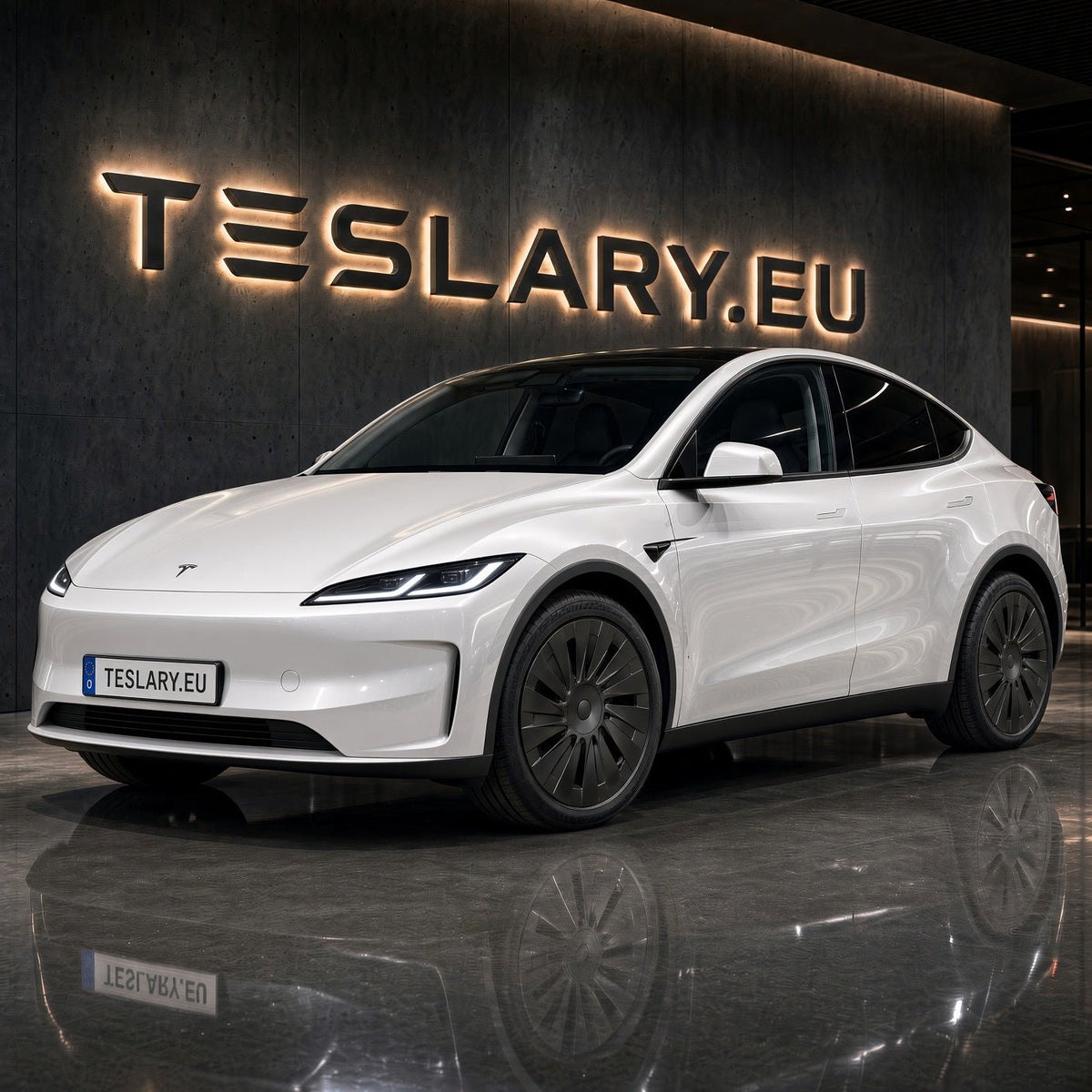 A white Tesla Model Y STANDARD RWD is parked indoors in front of a dark wall with a large illuminated TESLARY.EU sign. TESLA_MODEL_Y_18_INCH_RWD_STANDARD_WHEEL_COVERS_2026_BUY_FROM_IRELAND_AND_EUROPES_TESLARY.EU_WITH_FREE_DELIVERY_ACROSS_EUROPE_WITH_FEDEX_TESLARY.EU_TESLARY.IE_TESLARY.FI_TESLARY.PT_TESLARY.IT